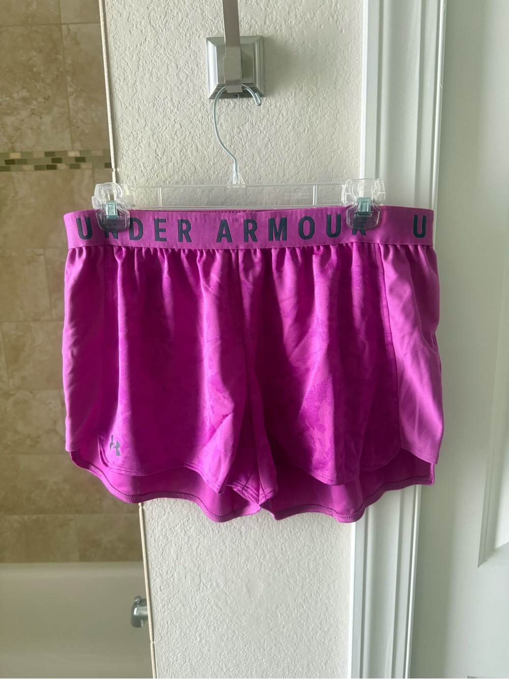 Under Armour Women's Magenta Athletic Shorts with Logo Waistband